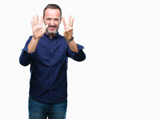 Fototapeta premium Middle age hoary senior man over isolated background showing and pointing up with fingers number eight while smiling confident and happy.