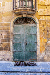 Beautiful old closed door in Valletta, Malta