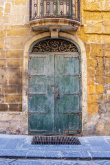 Beautiful old closed door in Valletta, Malta
