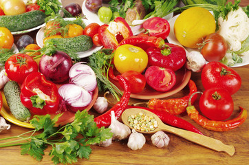 Vegetables on the table. Carrots, beets, tomatoes, cabbage, peppers, cucumbers, peas, garlic, parsley