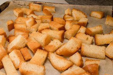 Fresh fried (baked) crunchy crispy golden croutons (traditional snack like cracker) from white bread