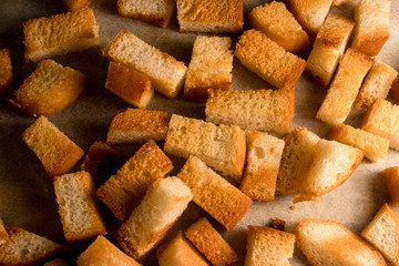 Fresh fried (baked) crunchy crispy golden croutons (traditional snack like cracker) from white bread