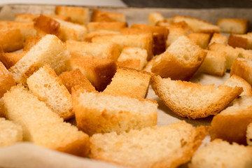 Fresh fried (baked) crunchy crispy golden croutons (traditional snack like cracker) from white bread