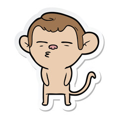 sticker of a cartoon suspicious monkey
