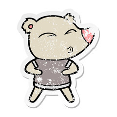 distressed sticker of a cartoon whistling bear
