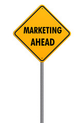 yellow square caution sign with text marketing ahead