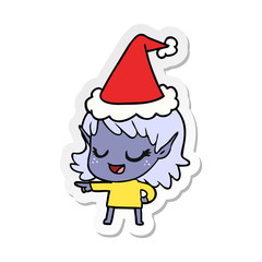 happy sticker cartoon of a elf girl pointing wearing santa hat