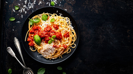 delicious appetizing classic spaghetti pasta with parmesan - obrazy, fototapety, plakaty