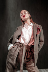 Attractive young female person posing on camera