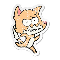 distressed sticker of a cartoon grinning fox