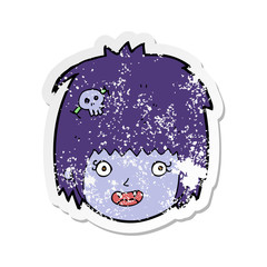 retro distressed sticker of a cartoon happy vampire girl face