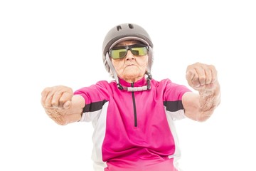 Elderly woman in pink shirt with a bike