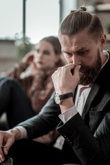 Bearded father feeling worried about depression of daughter