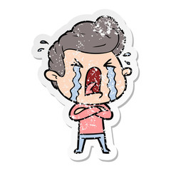 distressed sticker of a cartoon crying man