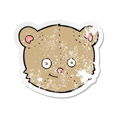 retro distressed sticker of a cartoon teddy bear head