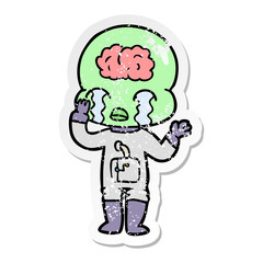 distressed sticker of a cartoon big brain alien crying