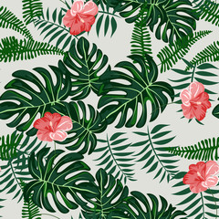 Tropical leaves and flowers pattern. Hawaiian seamless pattern with tropical plants.