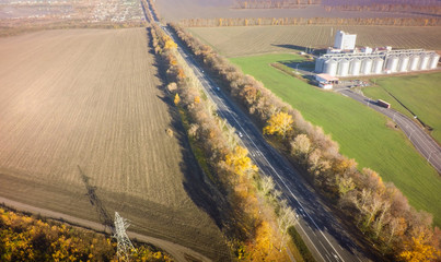 Empty road for cars aerial view from top around green nature