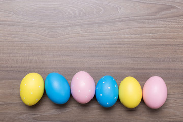 Easter eggs on wooden background