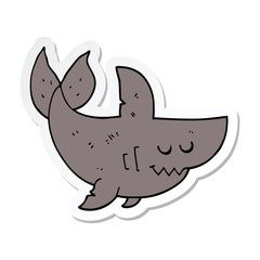 sticker of a cartoon shark