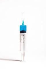 Syringe injection with needle isolated on white background