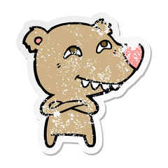 distressed sticker of a cartoon bear showing teeth