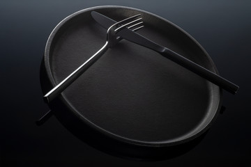 black cutlery on black