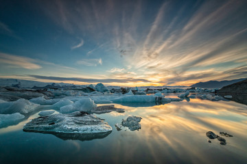 Iceland - Jokularslon glacier lagoon sunset in summer with dynamic clouds