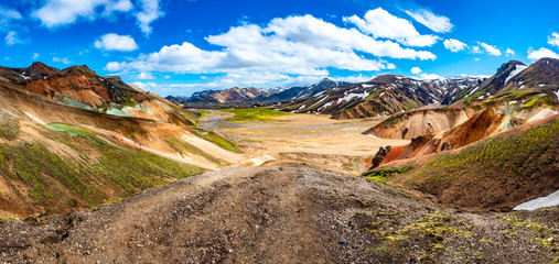Beautiful colorful volcanic mountains Landmannalaugar as pure wilderness in Iceland, summer time, blue sky