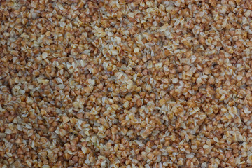 Buckwheat. Background and texture of buckwheat. Boiled buckwheat. buckwheat boiled grits. Russian groats.