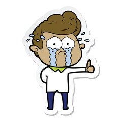 sticker of a cartoon crying man