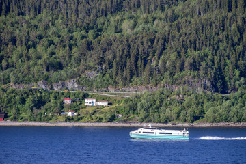 Obraz premium fast ferry in Norwegian fjord