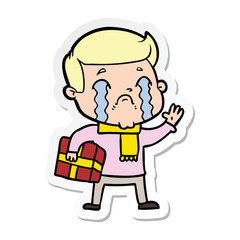 sticker of a cartoon man crying