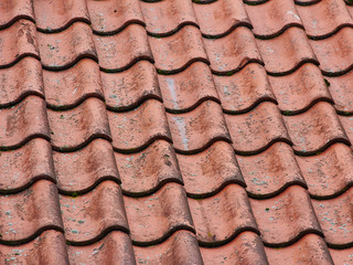 Facade of a building with rectangular windows with reflections