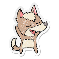 Obraz na płótnie Canvas distressed sticker of a cartoon wolf laughing
