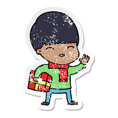 distressed sticker of a happy cartoon boy