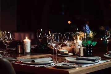 Deurstickers luxury tableware beautiful table setting in restaurant © Alexey