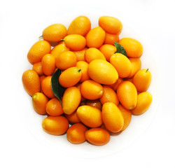 Small oranges on the white background. Nature fruits background.