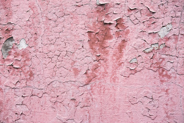 The texture of the concrete wall from which the paint peeled off. Texture of the destroyed concrete wall for design.