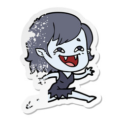 distressed sticker of a cartoon laughing vampire girl