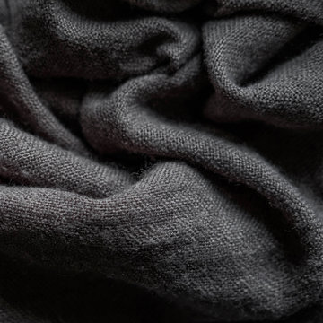 Macro photo of fabric gray. Knitting, wool. Texture of fabric with folds for designers. Blank for banner atelier, mester