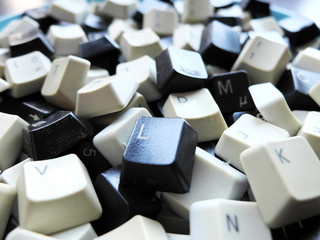 Black and white computer keyboard keys close-up. Concept of unstructured big data that need to be...