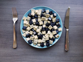 Black and white computer keyboard keys on the plate. Concept of unstructured big data that need to...