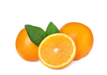 Fresh ripe oranges with leaves isolated on white