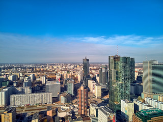 Beautiful panoramic aerial drone view to panorama cityscape of Warsaw modern City, "Rondo 1" office skyscraper located at Rondo ONZ and Q22