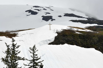 Cross on the Mountain Peak