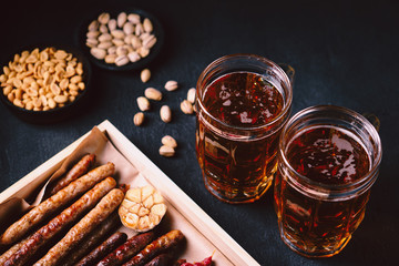 beer snacks. bar menu. restaurant, pub, oktoberfest. variety of delicious appetizers. homemade grilled sausages, salami. meat delicatessen. friday party atmosphere, craft brewery concept