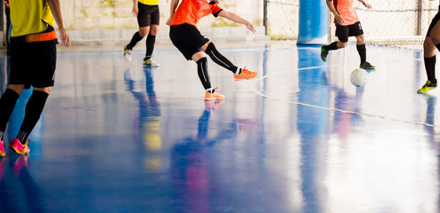 Indoor soccer sports hall. Football futsal player, ball, futsal floor. Sports background. Youth...