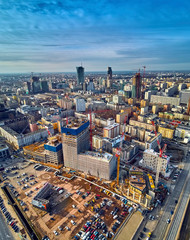 Fototapeta premium Beautiful panoramic aerial drone view to the center of Warsaw City and Varso - neomodern office building under construction, designed by Foster and Partners