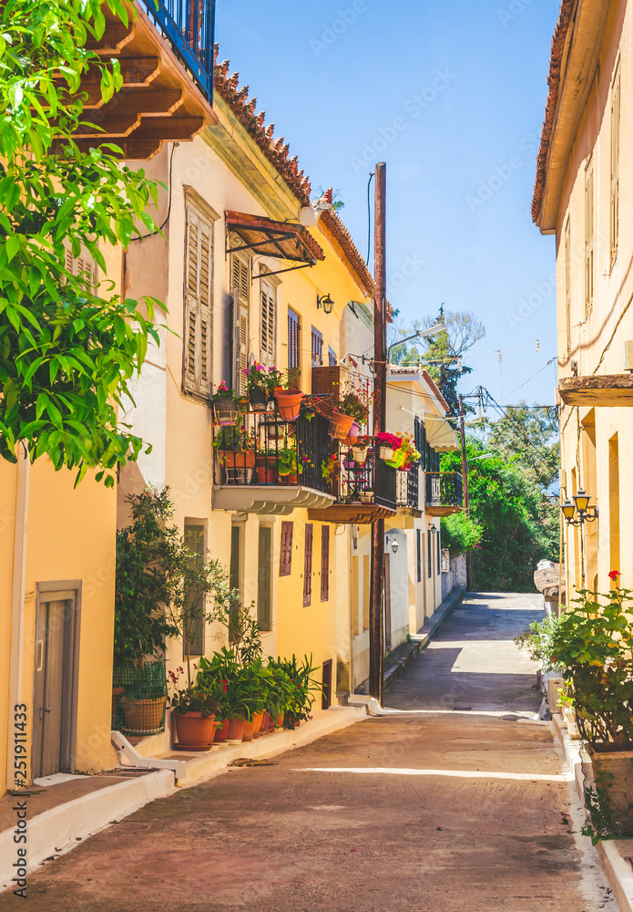 Wall mural Traditional cozy greek street in city Nafplio, Greece